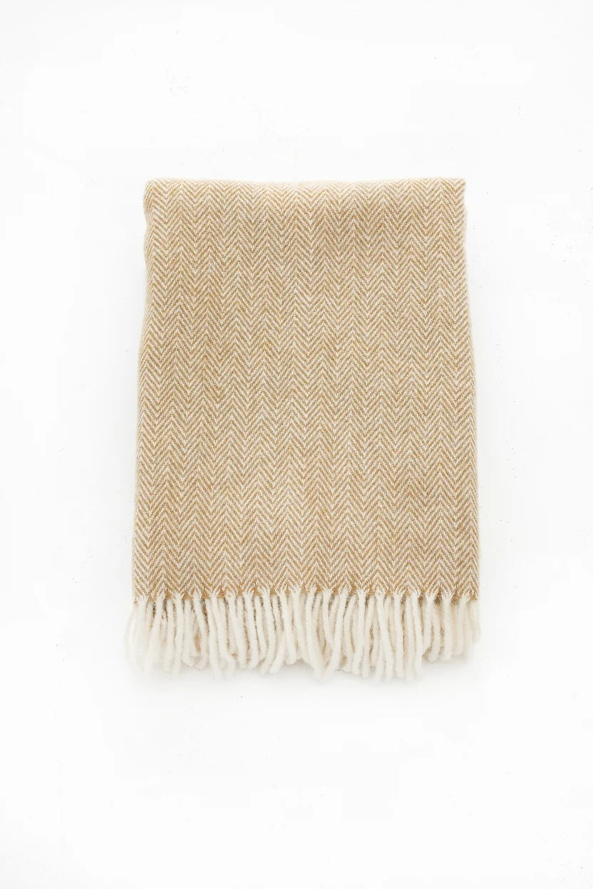 Palliser Ridge Herringbone throw in Mustard folded flat, showing the herringbone weave