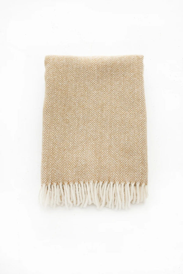 Palliser Ridge Herringbone throw in Mustard folded flat, showing the herringbone weave