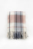 Palliser Ridge Twill Check lambswool throw in Blush, folded to show the check pattern and fringed edge