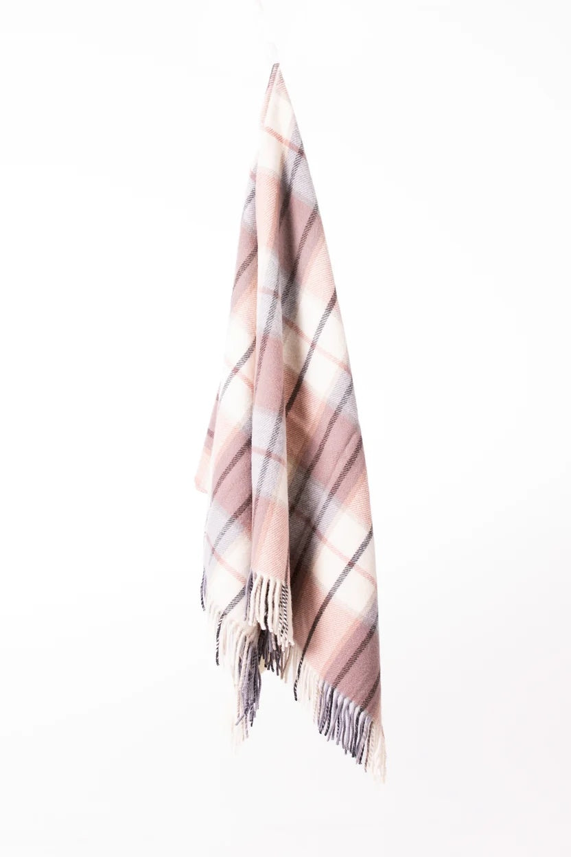 Palliser Ridge Twill Check lambswool throw in Blush, hanging to show the full check pattern
