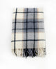 Palliser Ridge Twill Check lambswool throw in Dove Grey, folded flat showing the check pattern