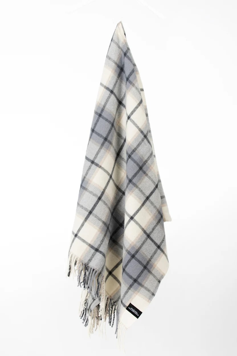 Palliser Ridge Twill Check lambswool throw in Dove Grey, hanging to show the full check pattern