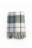 Palliser Ridge Twill Check lambswool throw in Forest, close view of the check pattern and fringed edge