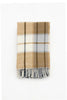 Palliser Ridge Twill Check lambswool throw in Mustard, folded on a plain background