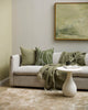 Modern living room featuring the olive green Baya picchu cushion