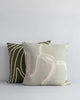 Two designer cushions by Baya, one light green gry and one Olive green