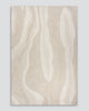 View from above of the Baya 'Shoreline' wool rug showing its patterned cut and loop pile design