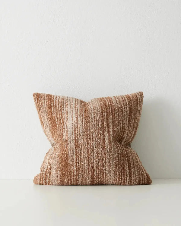 A textural, woven cushion in warm brown tones, by Weave Home nz 