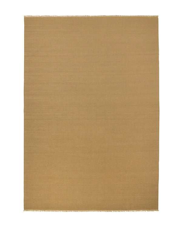 Weave Home Jacqueline wool rug in Brulee, full flatweave rug with fringed edges on a plain background.