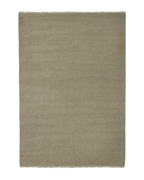 Weave Home Jacqueline wool rug in Pumice on a plain background, shown flat with fringed ends