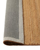 Weave Home Monroe jute rug in Biscuit folded back to show the cotton backing