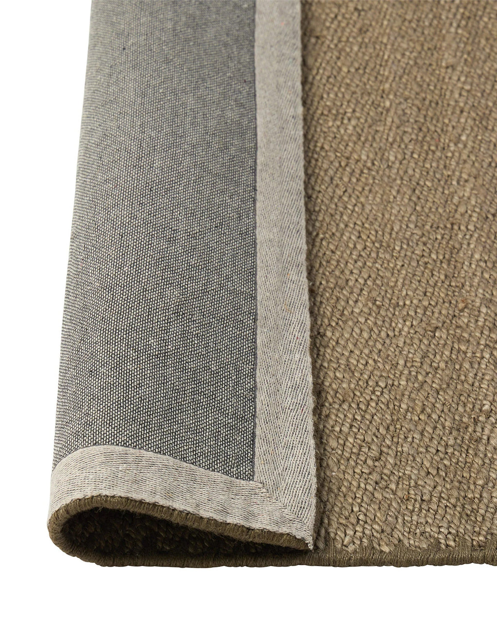 Weave Home Monroe jute rug in Flint folded back to show the cotton backing