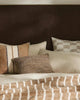 A stylish bed setting that icludes cushins by Weave Home nz, including the 'Vista Natural' design