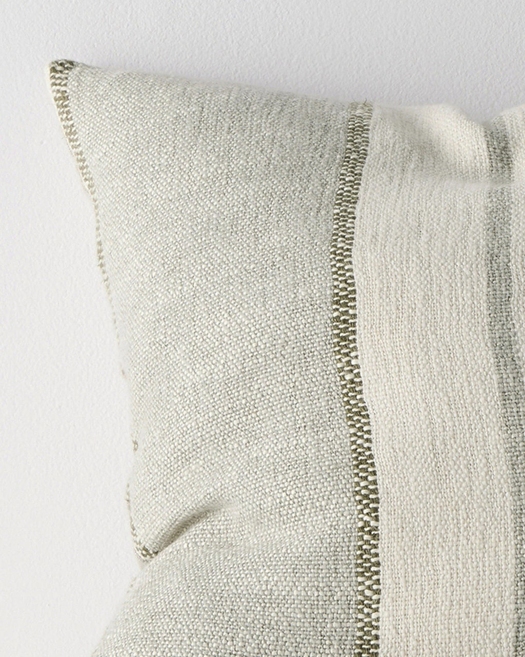 Close-up of the woven stripe texture on the Weave Home Ottavio cushion in Lagoon.