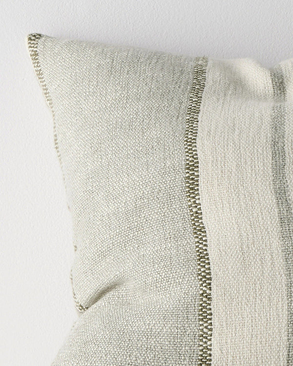 Close-up of the woven stripe texture on the Weave Home Ottavio cushion in Lagoon.