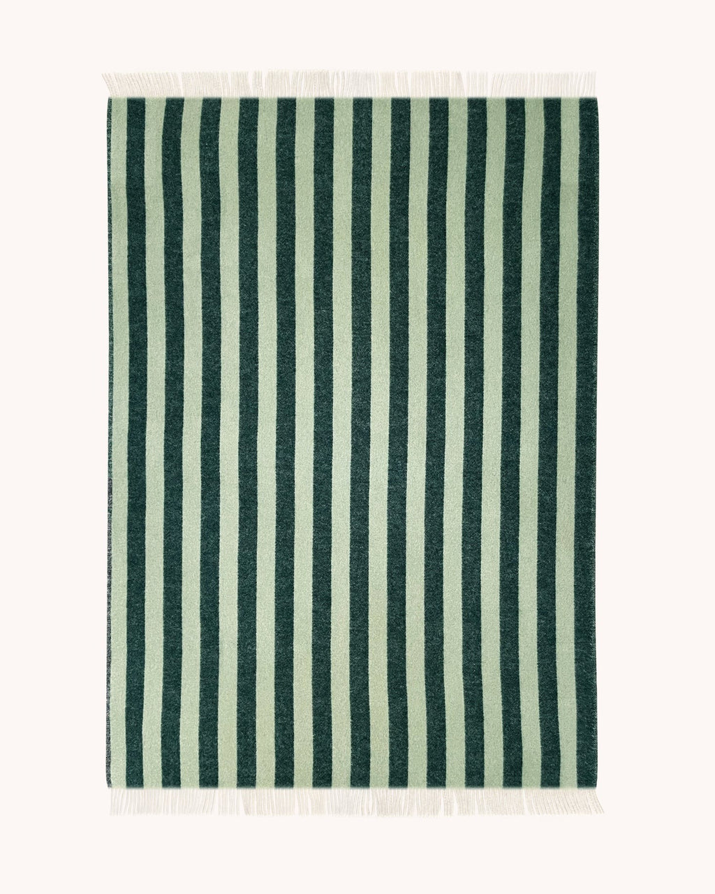 A full view of the reversed patten of the  Maison Deux Candy Stripe throw blanket, made from NZ wool, in shades of forest green and sage. 