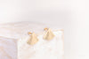A full view of a pair of square stud earrings with beautiful hammered gold-fill jackets, allowing multiple ways to wear. 