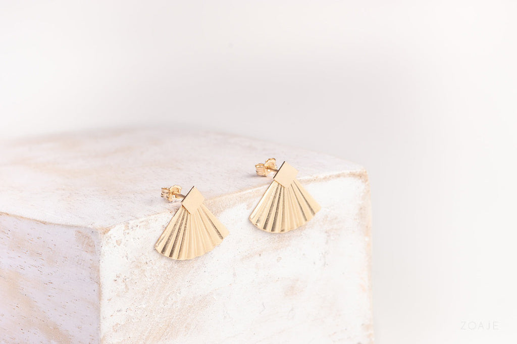 A full view of a pair of square stud earrings with beautiful hammered gold-fill jackets, allowing multiple ways to wear. 