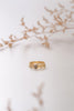 The Cambodia three-ring stack by Zoaje, made with yellow gold-fill rings and natural labradorite