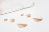 The China earrings by Zoaje, with the jackets laid out, all components seperated. 