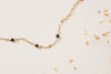 A close up of the chain of the Rouen braclet by Zoaje, showing off the black agate beads. 