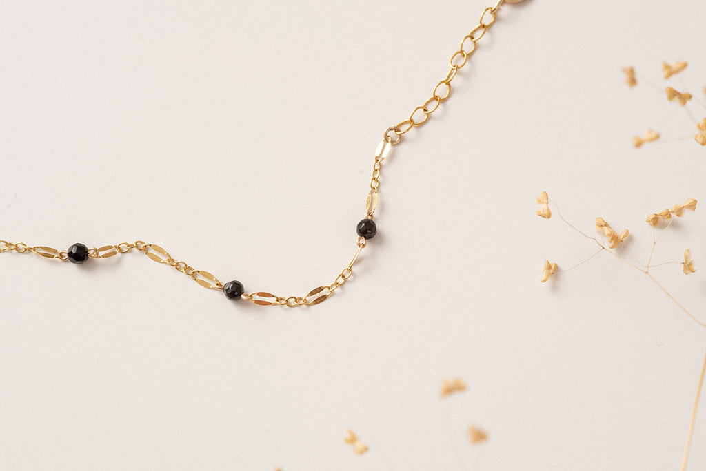 A close up of the chain of the Rouen braclet by Zoaje, showing off the black agate beads. 