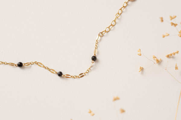 A close up of the chain of the Rouen braclet by Zoaje, showing off the black agate beads. 