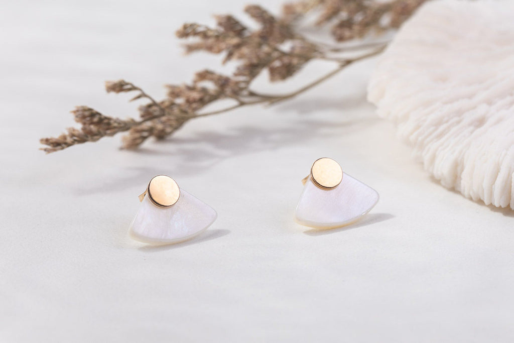 The Zoaje Ghana earrings, with beautiful gold-fill circles and mother-of-pearl accents. 