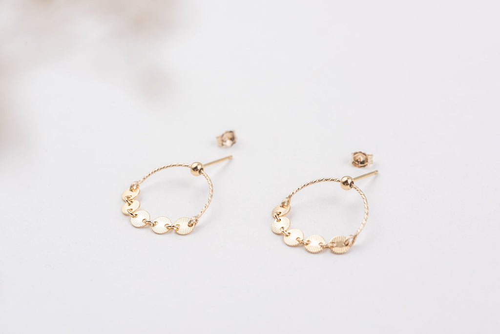 A full view of the Italy hoop earrings by Zoaje, with yellow gold fill. 