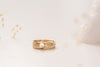 The Malaysia ring stack by Zoaje, with hammered gold-fill and a feature stone of natural white agate. 