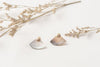 The grey shifting tones of the mother-of-pearl in the Laos stud earrings