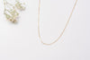 A section of the Oman necklace, a yellow gold filled chain link necklace with small (1cm approx) sections of chain flattened.