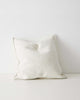 Creamy-white Ivory Alberto cushion featuring a boucle texture and soft feel, made by Weave Home NZ