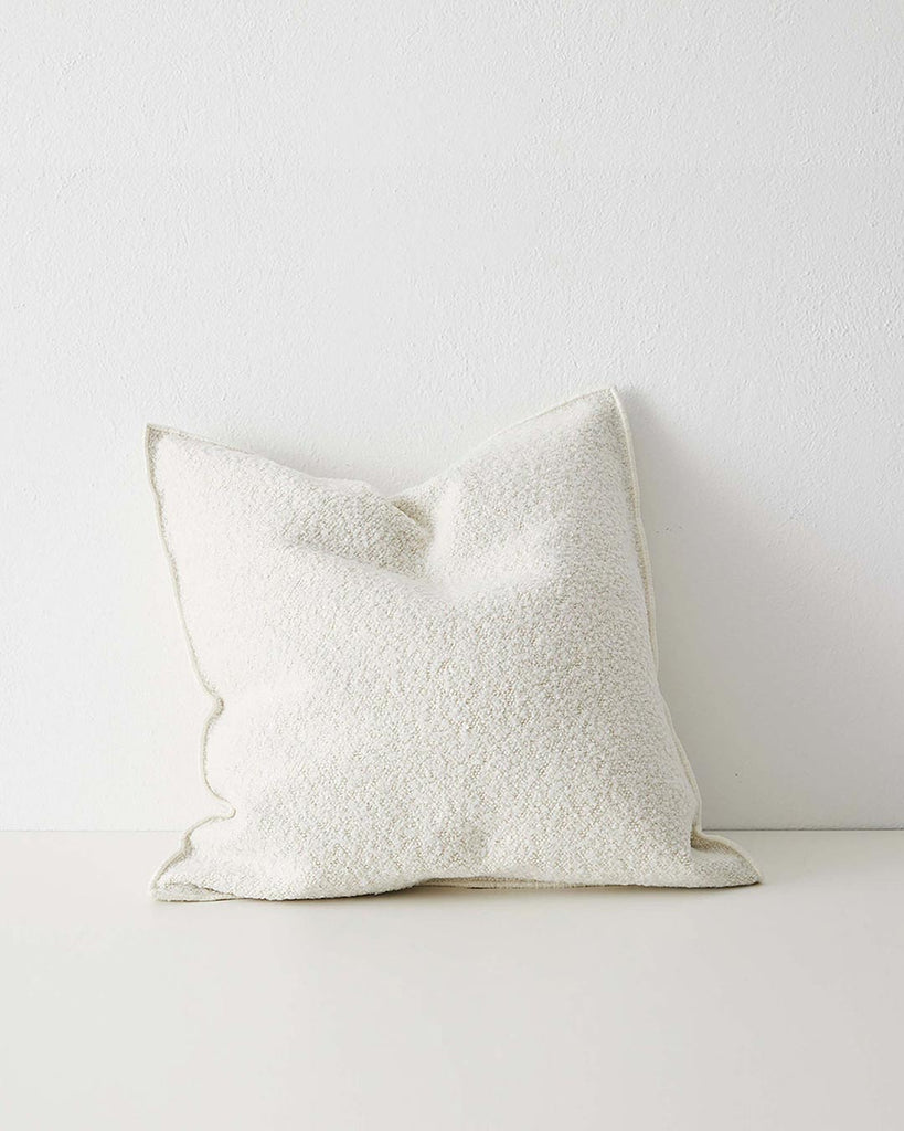 Creamy-white Ivory Alberto cushion featuring a boucle texture and soft feel, made by Weave Home NZ