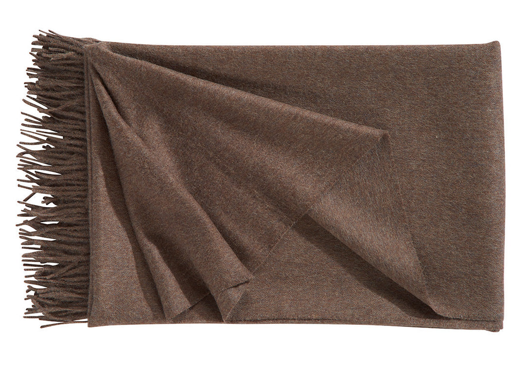 A luxurious Christian Fischbacher throw with fringe detail, made from soft warm alpaca yarn, and in a delicious mocha brown