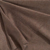 A close up of a luxurious Christian Fischbacher throw, made from soft warm alpaca yarn, and in a delicious mocha brown