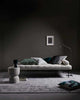 Weave Home NZ stylked room interior featuring a couch and beautiful. green and  linen cushions