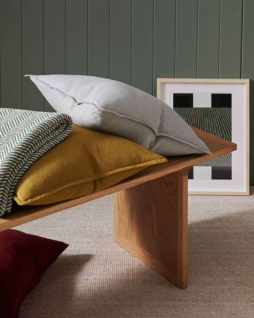 Weave Home NZ linen cushions styled in a green room interior