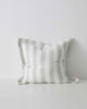 A modern, striped cushion in a pretty laurel green and white yarn-dyed stripe, made from European linen, by Weave Home NZ