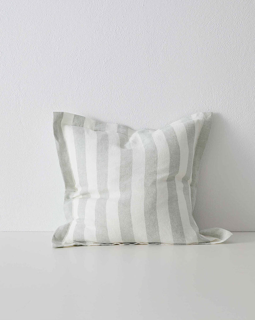 A modern, striped cushion in a pretty laurel green and white yarn-dyed stripe, made from European linen, by Weave Home NZ