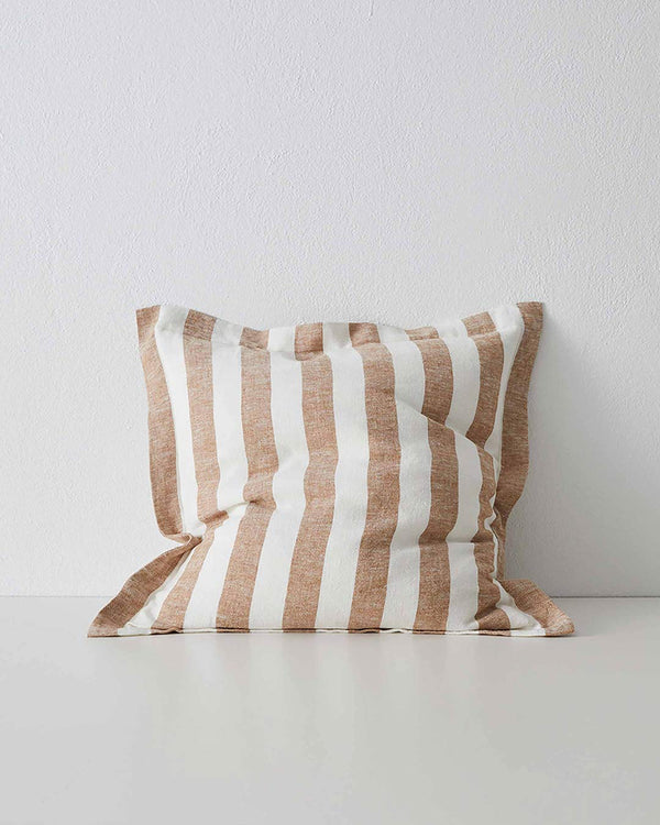 A modern yarn-dyed striped cushion in a spiced orange-brown and white, on premium European linen; by Weave Home NZ 