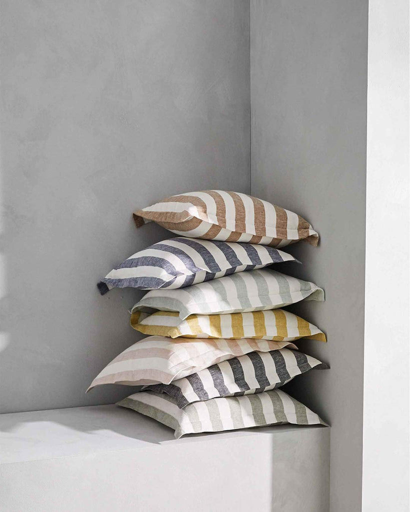 A gorgeous stack of modern striped cushions, made from European linen, by Weave Home NZ