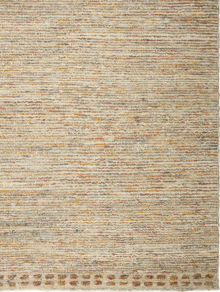 Textural details in blues, greys and oranges in the Tribe Home nz ridge wool floor rug