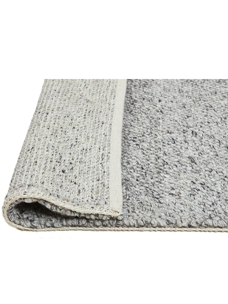 Tribe Home nz Aero rug in silver folded for view of underneath