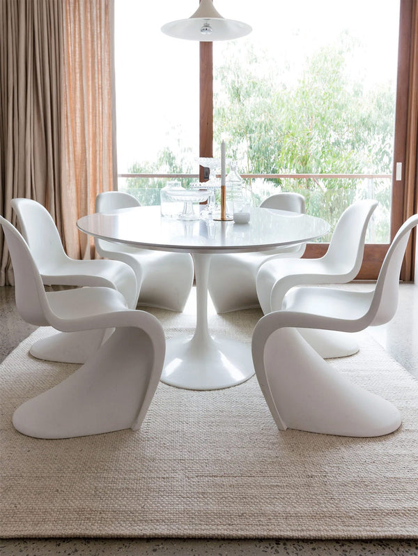 The Tribe Home NZ Skagen rug in colour ivory featured in a modern dining room setting