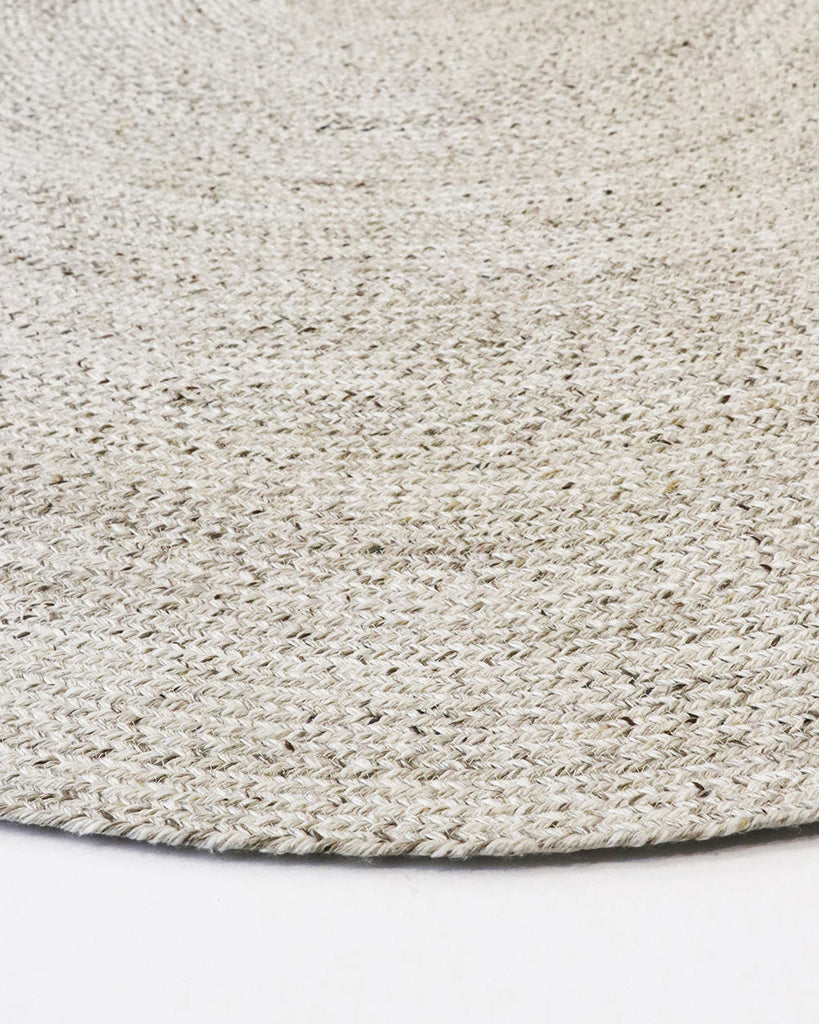 A detailed view of the corner of Baya NZ's outdoor rug in Mornington, shade Pale Sand, made from PET fibres. 
