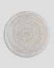 Full view of Baya NZ's Mornington in Pale Sand, a round outdoor rug in light, neutral tones. 